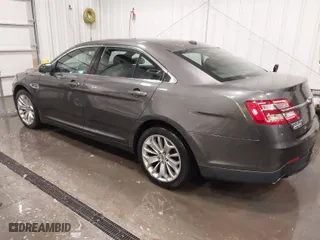 2015 Ford Taurus Limited with VIN 1FAHP2F87FG136199, listed as a IAAI auction lot 41920715 with 173,445 mi miles. Bid and sale history available at carsss.com. Image 3.