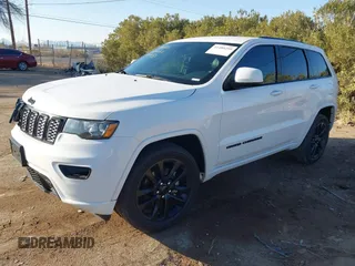2020 Jeep Grand Cherokee Altitude with VIN 1C4RJEAG1LC251934, listed as a IAAI auction lot 41480299 with 74,169 mi miles and . Bid and sale history available at DreamBid. Image 17.