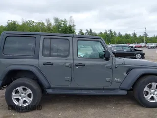 2020 Jeep Wrangler Unlimited Black and Tan with VIN 1C4HJXDG5LW187222, listed as a IAAI auction lot 42238194 with 9,237 mi miles and . Bid and sale history available at DreamBid. Image 13.