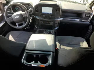 2023 Ford F-150 XL with VIN 1FTEW1CP4PKD21685, listed as a Copart auction lot 54992615 with 27,252 mi miles and Salvage title. Bid and sale history available at DreamBid. Image 8.
