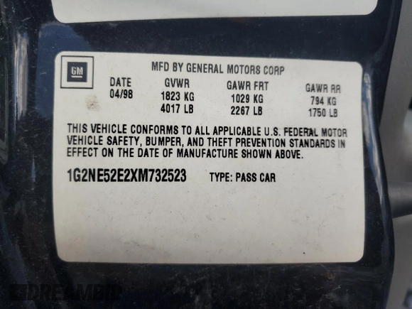 1999 Pontiac Grand Am SE2 with VIN 1G2NE52E2XM732523, listed as a Copart auction lot 75420684 with 124,110 mi miles and Salvage Title. Bid and sale history available at carsss.com. Image 15.