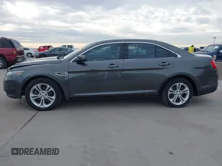 2017 Ford Taurus SEL z VIN 1FAHP2E80HG129843, wystawiony jako IAAI lot #41252910 z przebiegiem 111 923 mil mil oraz . Historia ofert i sprzedaży dostępna na DreamBid. Obrazek 14.