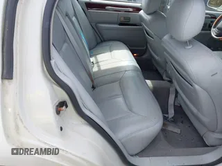 2004 Lincoln Town Car Ultimate z VIN 1LNHM83W64Y683461, wystawiony jako IAAI lot #42393678 z przebiegiem 145 841 mil mil oraz . Historia ofert i sprzedaży dostępna na DreamBid. Obrazek 8.