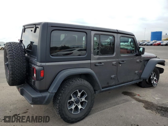 2022 Jeep Wrangler Unlimited Rubicon with VIN 1C4HJXFN9NW256461, listed as a Copart auction lot 43188065 with 26,944 mi miles and Salvage title. Bid and sale history available at DreamBid. Image 3.