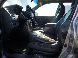 2005 Honda Pilot EX-L z VIN 2HKYF18635H569581, wystawiony jako Copart lot #57295595 z przebiegiem 209 697 mil mil oraz Szkoda całkowita • Salvage title. Historia ofert i sprzedaży dostępna na DreamBid. Obrazek 7.