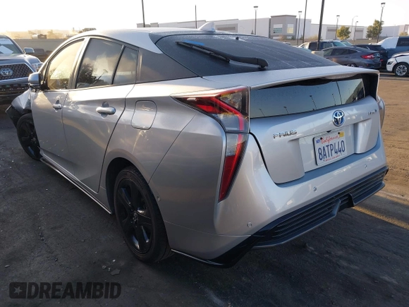 2017 Toyota Prius Two with VIN JTDKARFU3H3049806, listed as a IAAI auction lot 41811825 with 94,453 mi miles. Bid and sale history available at carsss.com. Image 3.