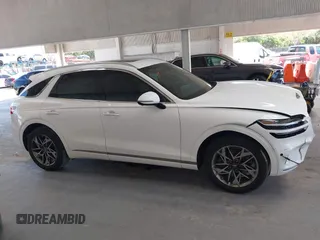 2022 Genesis GV70 2.5T with VIN KMUMADTBXNU045298, listed as a IAAI auction lot 42515480 with 82,599 mi miles and . Bid and sale history available at DreamBid. Image 14.