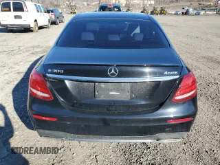 2019 Mercedes-Benz E-Class E 300 with VIN WDDZF4KB8KA594741, listed as a Copart auction lot 49678585 with 57,814 mi miles and Salvage Title. Bid and sale history available at carsss.com. Image 6.
