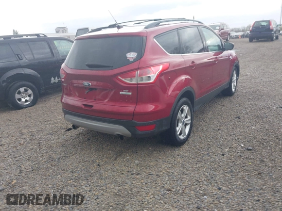 2013 Ford Escape SE with VIN 1FMCU0GXXDUB14120, listed as a IAAI auction lot 42060145 with 171,758 mi miles. Bid and sale history available at carsss.com. Image 4.