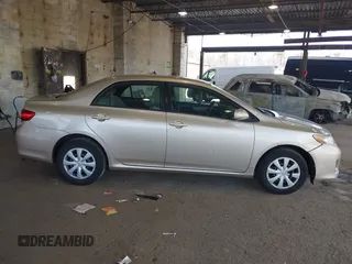 2011 Toyota Corolla L with VIN 2T1BU4EE3BC543537, listed as a IAAI auction lot 41906173 with 182,663 mi miles. Bid and sale history available at carsss.com. Image 14.