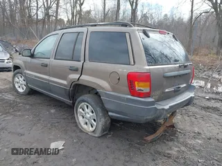 2001 Jeep Grand Cherokee Laredo with VIN 1J4GW48SX1C658610, listed as a IAAI auction lot 41831013 with 200,142 mi miles and . Bid and sale history available at DreamBid. Image 3.