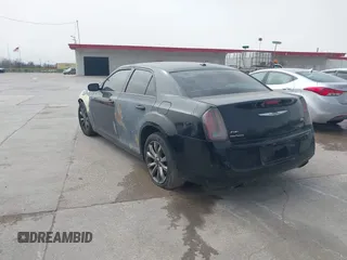 2014 Chrysler 300 with VIN 2C3CCAGG3EH384800, listed as a IAAI auction lot 41818031 with 147,335 mi miles. Bid and sale history available at carsss.com. Image 3.
