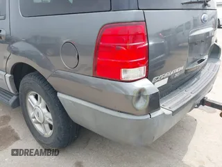 2005 Ford Expedition Special Service with VIN 1FMPU15545LA26180, listed as a IAAI auction lot 41806396 with 209,288 mi miles. Bid and sale history available at carsss.com. Image 13.