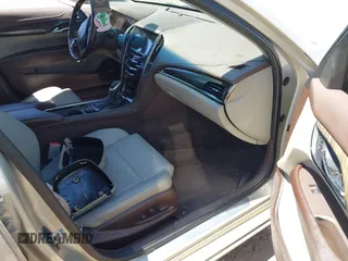 2013 Cadillac ATS Luxury z VIN 1G6AH5R35D0147866, wystawiony jako IAAI lot #42328457 z przebiegiem 142 197 mil mil oraz . Historia ofert i sprzedaży dostępna na DreamBid. Obrazek 5.
