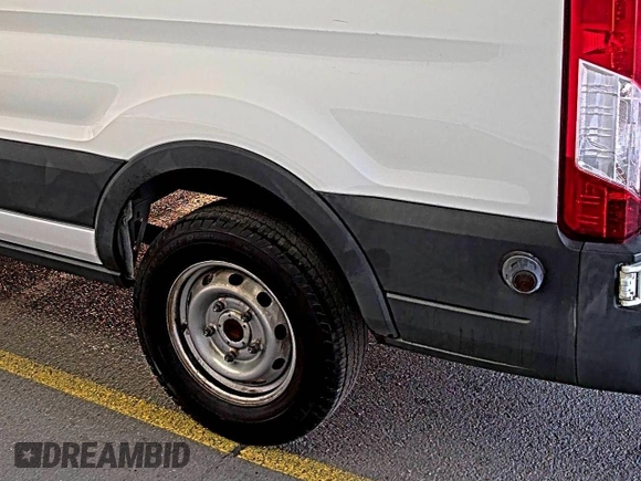2018 Ford Transit with VIN 1FTBW2ZM8JKA77066, listed as a IAAI auction lot 42642396 with 215,234 mi miles and . Bid and sale history available at DreamBid. Image 28.