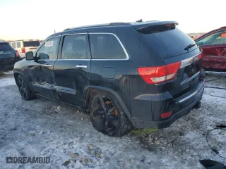 2012 Jeep Grand Cherokee Overland with VIN 1C4RJFCG0CC342518, listed as a Copart auction lot 41521325 with 174,896 mi miles and Clean Title. Bid and sale history available at carsss.com. Image 2.