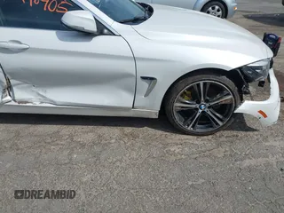2019 BMW 4 Series 430i xDrive z VIN WBA4J3C55KBL08387, wystawiony jako IAAI lot #42248405 z przebiegiem 115 017 mil mil oraz . Historia ofert i sprzedaży dostępna na DreamBid. Obrazek 17.