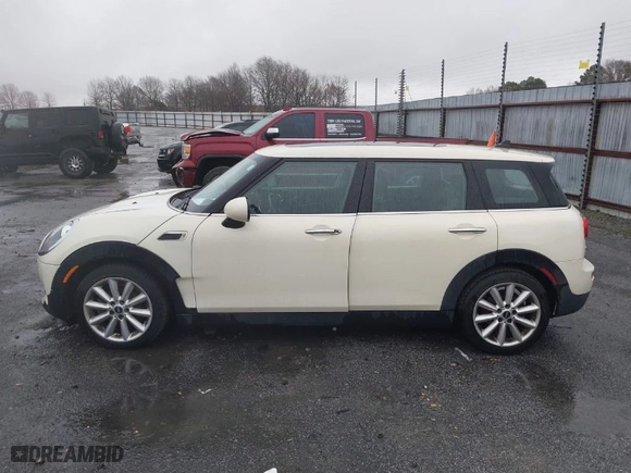 2016 MINI Cooper Clubman with VIN WMWLN5C59G2E30093, listed as a IAAI auction lot 41535638 with 89,224 mi miles. Bid and sale history available at carsss.com. Image 14.