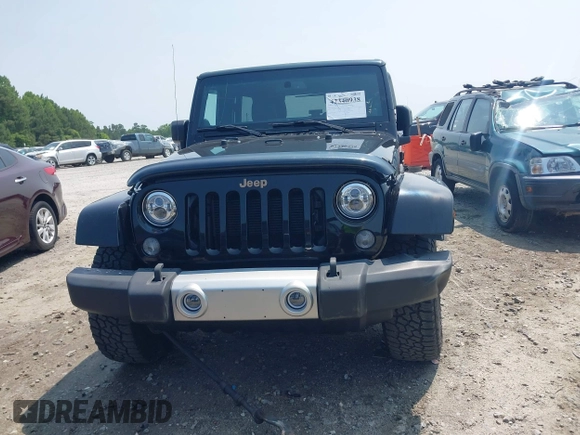 2014 Jeep Wrangler Unlimited Sahara with VIN 1C4BJWEG0EL273086, listed as a IAAI auction lot 42340938 with 121,448 mi miles and . Bid and sale history available at DreamBid. Image 12.