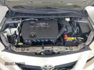 2009 Toyota Corolla with VIN 1NXBU40E79Z049147, listed as a IAAI auction lot 42654211 with 144,504 mi miles and . Bid and sale history available at DreamBid. Image 10.