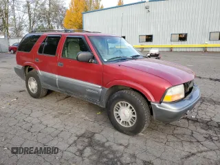1999 GMC Jimmy SLE with VIN 1GKDT13W6X2508118, listed as a Copart auction lot 79761444 with 195,738 mi miles and Salvage Title. Bid and sale history available at carsss.com. Image 4.