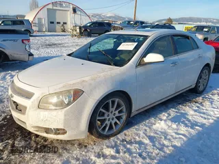 2012 Chevrolet Malibu LTZ with VIN 1G1ZG5E73CF270839, listed as a IAAI auction lot 41284490 with 133,423 mi miles and . Bid and sale history available at DreamBid. Image 17.