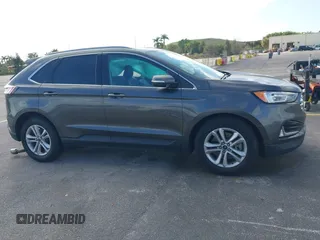 2020 Ford Edge SEL with VIN 2FMPK4J90LBA60985, listed as a IAAI auction lot 41590512 with 141,733 mi miles. Bid and sale history available at carsss.com. Image 13.