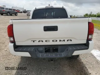 2021 Toyota Tacoma SR with VIN 3TYAX5GN5MT031086, listed as a Copart auction lot 55275375 with 55,279 mi miles and Salvage title. Bid and sale history available at DreamBid. Image 6.