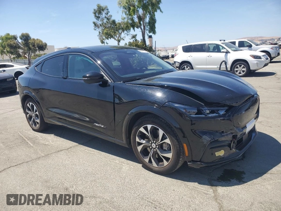 2022 Ford Mustang Mach-E Premium z VIN 3FMTK3R7XNMA24055, wystawiony jako Copart lot #62717525 z przebiegiem 25 079 mil mil oraz Szkoda całkowita • Salvage title. Historia ofert i sprzedaży dostępna na DreamBid. Obrazek 4.