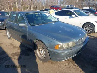 2001 BMW 5 Series 525iA with VIN WBADT43401GX23027, listed as a IAAI auction lot 41488393 with 200,960 mi miles. Bid and sale history available at carsss.com. Image 1.