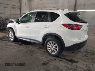 2014 Mazda CX-5 Touring with VIN JM3KE4CY4E0321055, listed as a IAAI auction lot 41613593 with 174,339 mi miles. Bid and sale history available at carsss.com. Image 3.