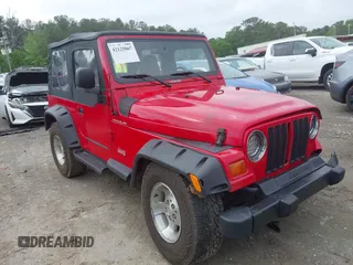 1999 Jeep Wrangler SE with VIN 1J4FY29P5XP487111, listed as a IAAI auction lot 42125867 with 156,804 mi miles and . Bid and sale history available at DreamBid. Image 1.
