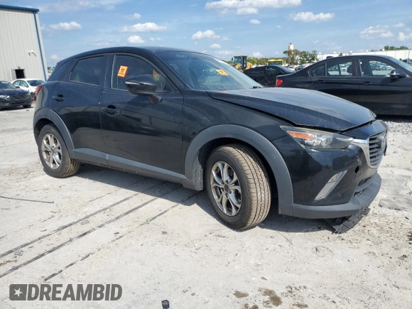 2016 Mazda CX-3 Touring with VIN JM1DKBC7XG0121516, listed as a Copart auction lot 48632965 with 119,449 mi miles and Salvage Title. Bid and sale history available at carsss.com. Image 4.