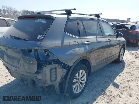 2018 Volkswagen Tiguan S with VIN 3VV0B7AX7JM104662, listed as a IAAI auction lot 41781658 with 235,461 mi miles and . Bid and sale history available at DreamBid. Image 4.