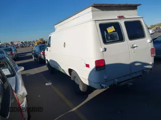 1995 GMC Vandura z VIN 1GTEG25K5SF548518, wystawiony jako IAAI lot #40664471 z przebiegiem 157 506 mil mil oraz . Historia ofert i sprzedaży dostępna na DreamBid. Obrazek 3.