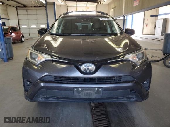 2018 Toyota RAV4 LE with VIN JTMBFREV9JJ743672, listed as a Copart auction lot 62510955 with 141,971 mi miles and Salvage title. Bid and sale history available at DreamBid. Image 5.