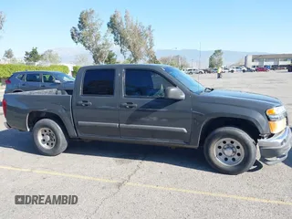 2005 GMC Canyon 1SC SLE Z85 with VIN 1GTCS136858251760, listed as a IAAI auction lot 41955352 with 218,594 mi miles. Bid and sale history available at carsss.com. Image 13.