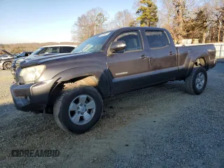 2015 Toyota Tacoma PreRunner with VIN 3TMKU4HN2FM043748, listed as a Copart auction lot 88764915 with 160,731 mi miles and Salvage title. Bid and sale history available at DreamBid. Image 1.