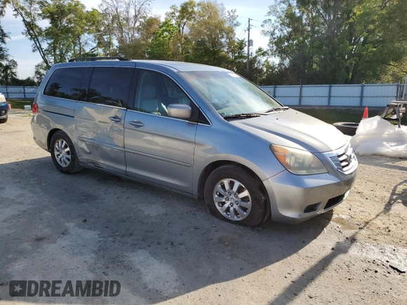2009 Honda Odyssey EX-L with VIN 5FNRL38749B006271, listed as a Copart auction lot 50619625 with 210,017 mi miles and Salvage Title. Bid and sale history available at carsss.com. Image 4.