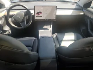 2022 Tesla Model 3 Long Range with VIN 5YJ3E1EBXNF188596, listed as a Copart auction lot 51846915 with 49,271 mi miles and Non Repairable. Bid and sale history available at carsss.com. Image 8.