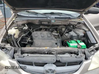 2002 Mazda Tribute LX with VIN 4F2YU09132KM24637, listed as a Copart auction lot 88919855 with 211,198 mi miles and Salvage Title. Bid and sale history available at carsss.com. Image 12.