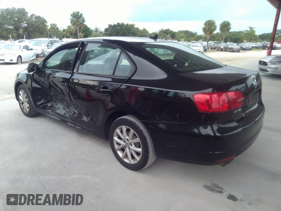 2011 Volkswagen Jetta Sedan SE with VIN 3VWDX7AJ7BM390282, listed as a IAAI auction lot 41673478 with 196,094 mi miles. Bid and sale history available at carsss.com. Image 3.