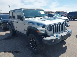 2023 Jeep Wrangler Rubicon with VIN 1C4JJXR67PW703197, listed as a IAAI auction lot 42355066 with 33,702 mi miles and . Bid and sale history available at DreamBid. Image 1.