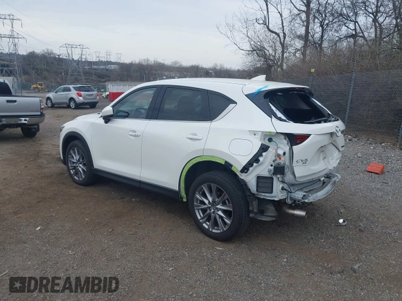 2020 Mazda CX-5 Grand Touring with VIN JM3KFBDM5L0731373, listed as a IAAI auction lot 41900567 with 31,268 mi miles and . Bid and sale history available at DreamBid. Image 3.