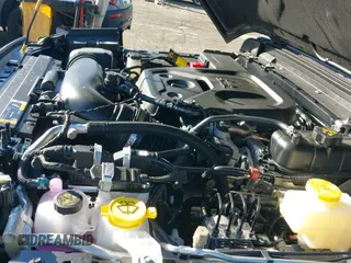 2025 Jeep Wrangler Sport S with VIN 1C4PJXDN7SW517144, listed as a IAAI auction lot 41643143 with 127 mi miles and . Bid and sale history available at DreamBid. Image 19.