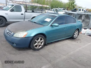 2003 Nissan Altima SE z VIN 1N4BL11D63C282757, wystawiony jako IAAI lot #41859329 z przebiegiem 218 391 mil mil oraz . Historia ofert i sprzedaży dostępna na DreamBid. Obrazek 2.