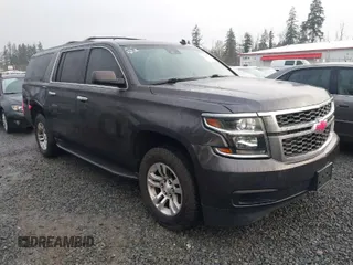 2015 Chevrolet Suburban LT with VIN 1GNSKJKC6FR155826, listed as a IAAI auction lot 41335320 with 187,713 mi miles and . Bid and sale history available at DreamBid. Image 1.