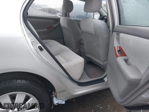 2004 Toyota Corolla CE with VIN JTDBR38E642035944, listed as a IAAI auction lot 42173263 with 119,302 mi miles. Bid and sale history available at carsss.com. Image 8.