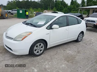 2006 Toyota Prius with VIN JTDKB20U567529834, listed as a IAAI auction lot 42119723 with 209,638 mi miles. Bid and sale history available at carsss.com. Image 2.