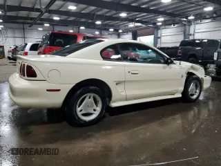 1996 Ford Mustang with VIN 1FALP4045TF168100, listed as a Copart auction lot 60464845 with 116,702 mi miles and Salvage title. Bid and sale history available at DreamBid. Image 3.